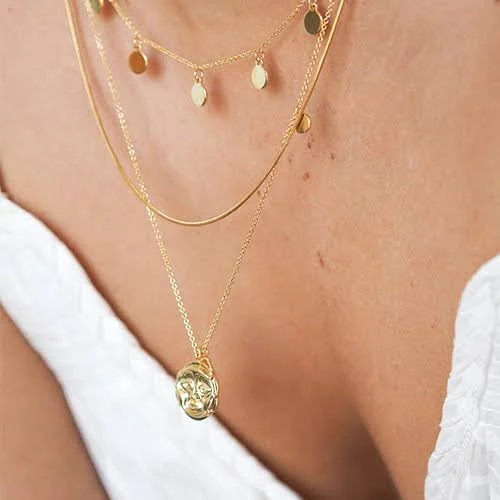 Layered gold YCL Jewels necklaces
