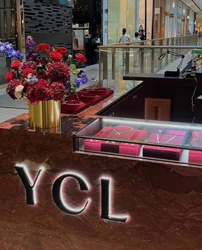YCL Jewels boutique storefront with illuminated signage and jewellery displays